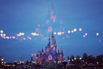 Disneyland's iconic castle at night.