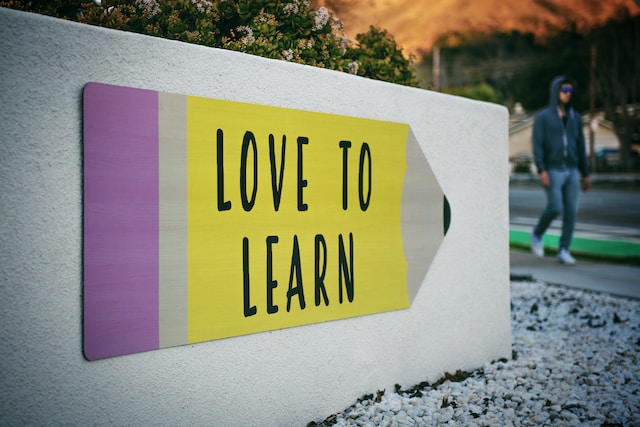 A sign saying love to learn